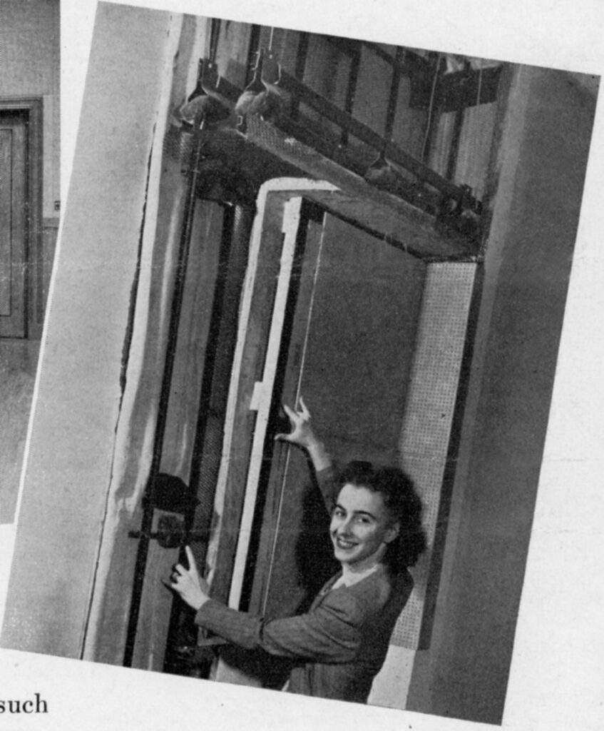 Woman smiling and raising her hands
